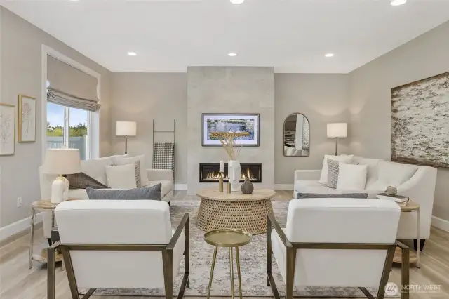Experience modern living at its finest with a Mezzo remote control gas/LED fireplace as the room's focal point. Adding to the sophisticated design is a professionally mounted LG TV, seamlessly integrated as a dynamic art display.