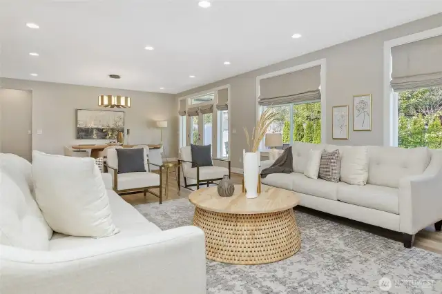 Enjoy the beauty of the Pacific Northwest from your light-filled living room, thanks to a stunning wall of windows. The one-story living extends to the covered patio, complete with heaters for cool evenings, a convenient plumbed gas line for grilling, ambient lighting, and plentiful space for gardening.