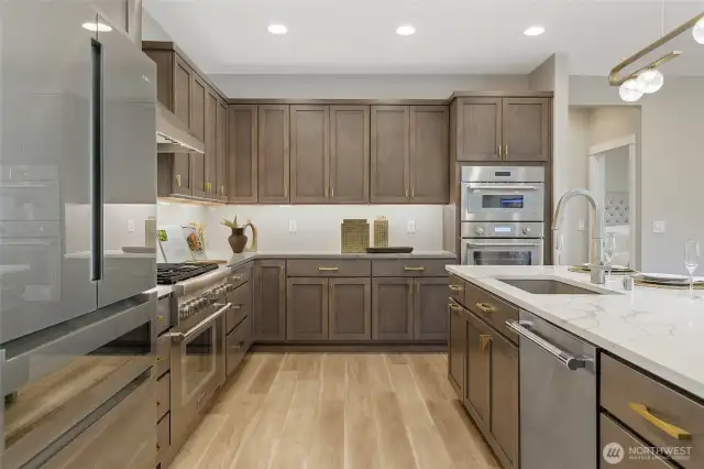 Culinary enthusiasts will adore the decadent kitchen, featuring a suite of premium Thermador and Bosch appliances, including the versatility of gas, electric and convection cooking options.