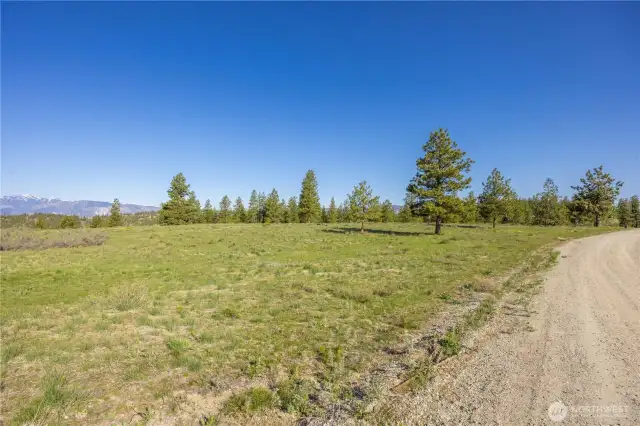 Drive straight up Union Valley Road, all the way up to Chelan Vista Heights-East. Access the Coded gate and drive all the way up Blazing Star Lane....It is signed.  No hiking, just step out of your vehicle and you're there!