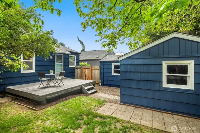 Simple and serene, this back deck is an invitation to slow down and stay awhile.