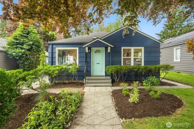 Shaded by the stunning copper beech tree, the front garden sets the tone for all the charm you'll find inside.