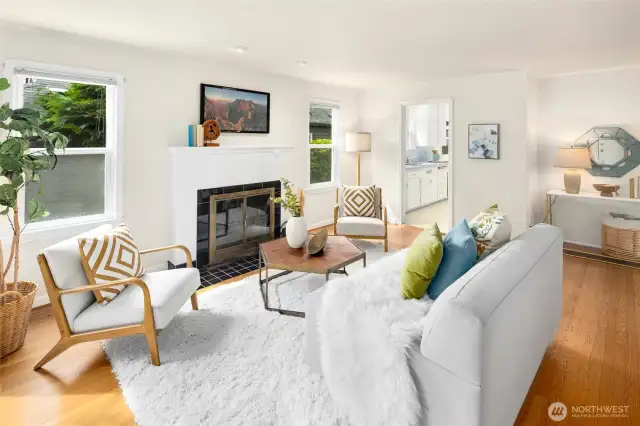 A perfect blend of original charm and simple style, clean lines and natural light give the living room a calm, airy vibe.