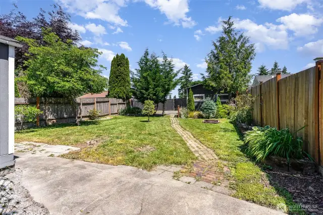 Another great view of the backyard, enjoy as is or come make it your own!