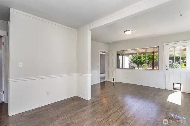 Just off the kitchen, you'll find a dedicated dining space plus a cozy nook—ideal for a home office, homework station, or additional storage.