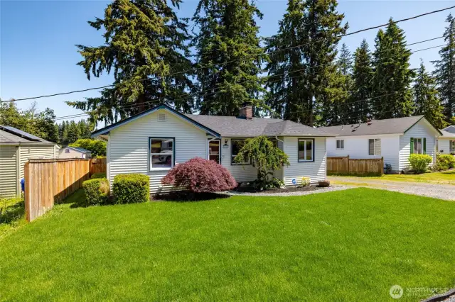 Sitting proud in a neighborhood that shows care. That's a new sod yard !