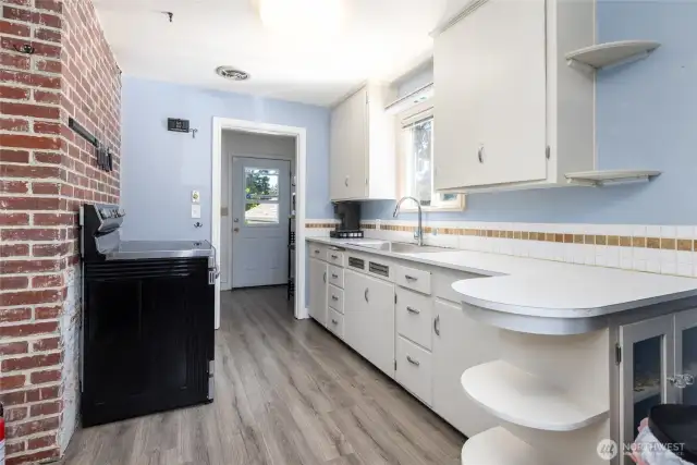 Freshly painted kitchen  cabinets.