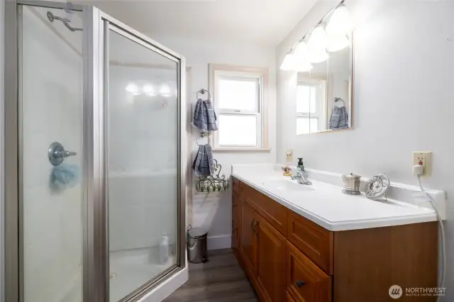 Primary bath has walk in shower.   Primary bath with walk in shower, plenty of counter space.