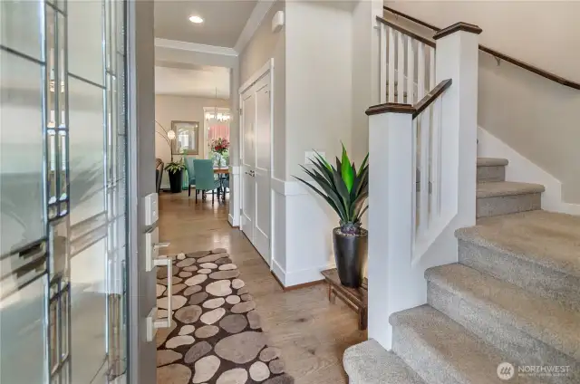Enter to vaulted ceilings and main floor engineered hardwood floors throughout.