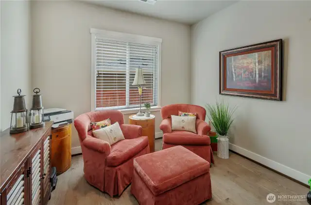 Main floor bedroom/den is large enough for a great guest room.