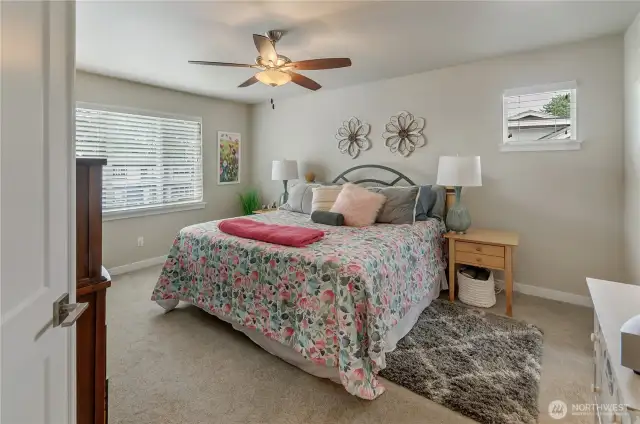 double doors separate the Primary Bedroom Suite from the other bedroom wing of this home.