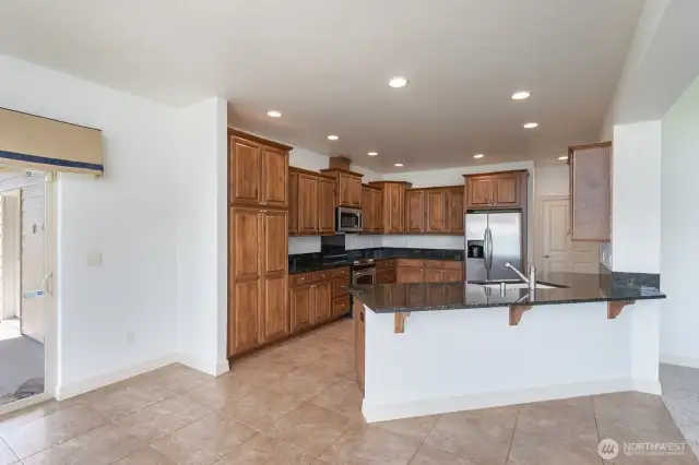 Open Concept Kitchen with custom cabinetry.