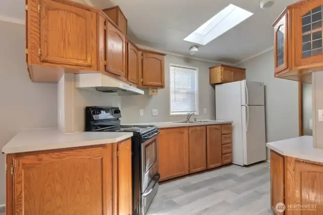 Kitchen with wood cabinets