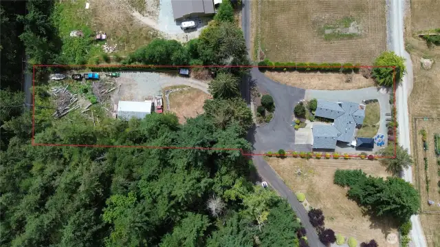 The red line shows the 1.04 acres with the house and shop.