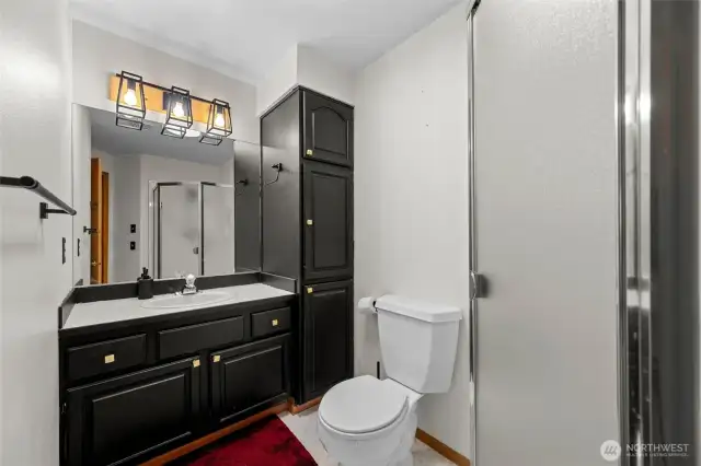 Lower 3/4 bath with plenty of storage.