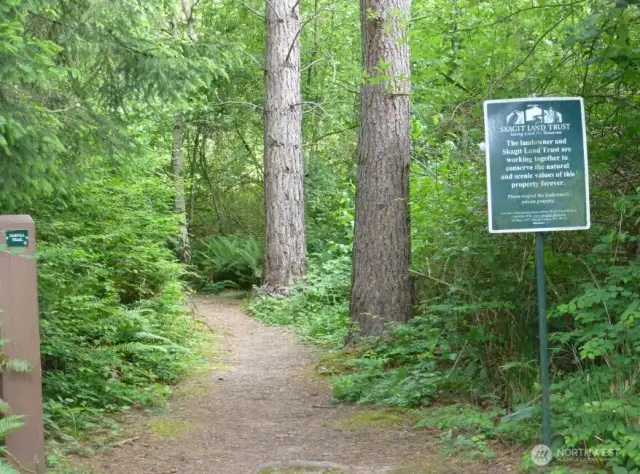 This the Skagit Land Trust trail head just steps from the property.