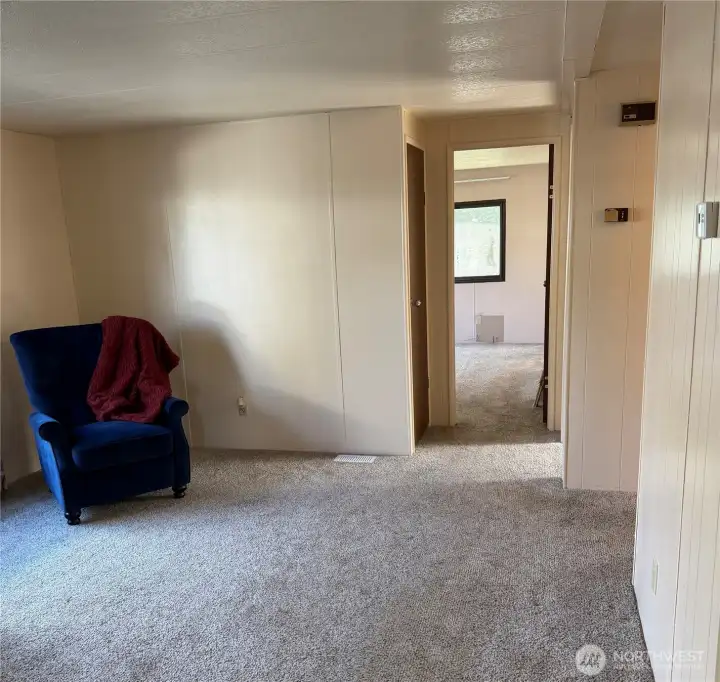 Sitting area looking towards primary bedroom