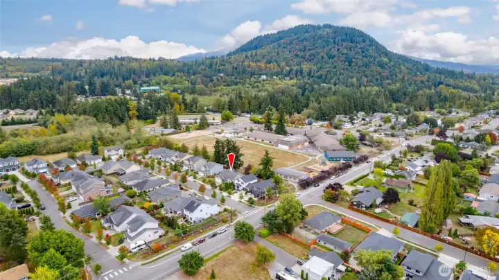 Red marks the spot! The home backs to Jefferson Elementary School play field. Little Mountain is off in the distance for hiking, walking and mountain biking!