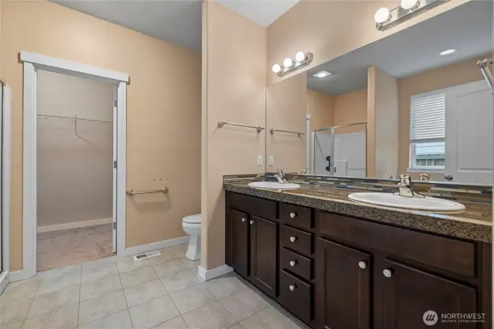 Very spacious Primary bathroom. 2 sinks, soaker tub, walk in shower and walk-in closet.