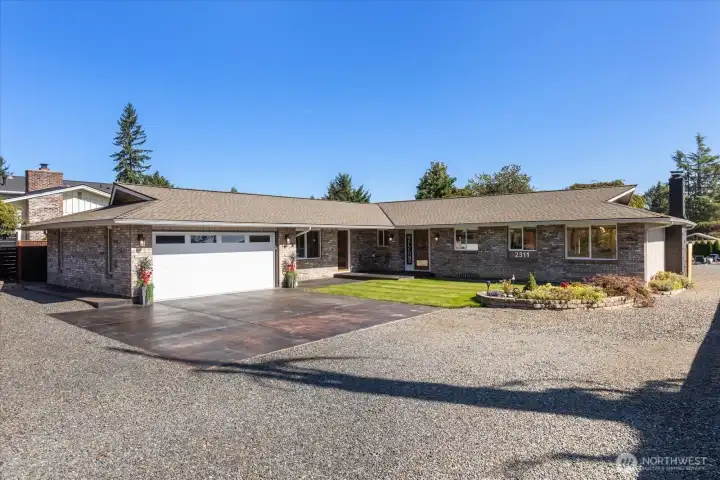 Welcome home to this fully updated single-story rambler with a 504 sqft attached garage and a 960 sqft detached shop, set on a private lot in the heart of Lake Stevens with mountain views!