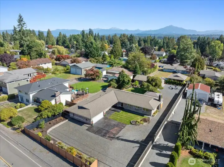 Welcome home to this fully updated single-story rambler with a 504 sqft attached garage and a 960 sqft detached shop, set on a private lot in the heart of Lake Stevens with mountain views!