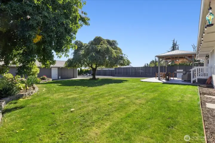0.37 acre property with private and fully fenced yard. Double gate perfect for secure RV and boat parking.