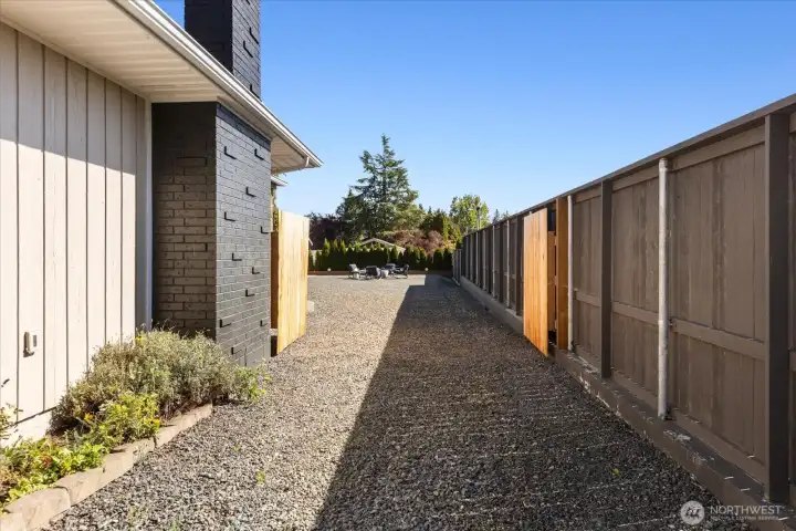 0.37 acre property with private and fully fenced yard. Double gate perfect for secure RV and boat parking.