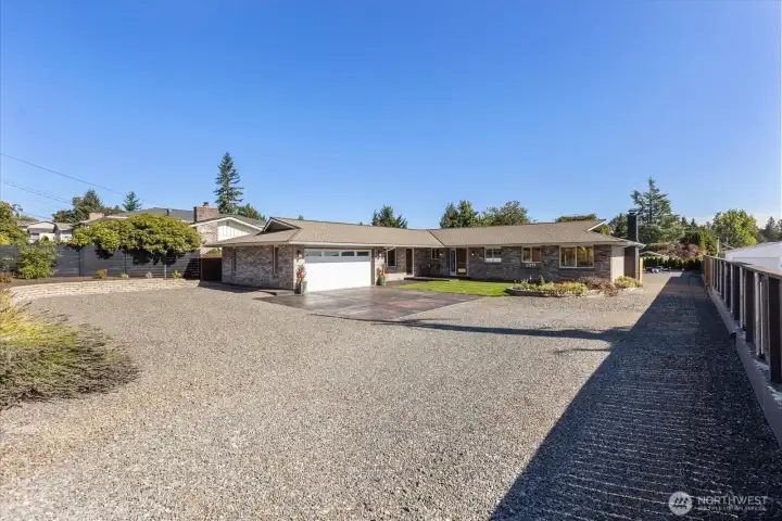 Welcome home to this fully updated single-story rambler with a 504 sqft attached garage and a 960 sqft detached shop, set on a private lot in the heart of Lake Stevens with mountain views!
