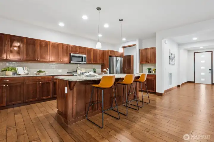 Beautiful kitchen, cabinets galore, huge island, and that's not all!