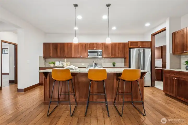 Seating for everyone at the kitchen island. Where everyone loves to gather.