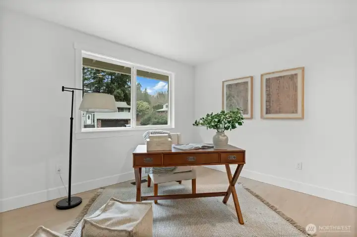 Strategic spatial planning allows this secondary suite to function as a premier home office or a private library. The architectural alignment ensures a seamless connection to the primary living areas while maintaining necessary professional seclusion.