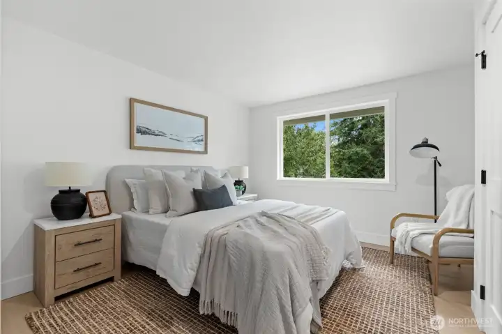Consistency in quality is maintained throughout the residence. This third bedroom features the same high-quality millwork and expansive architecture found in the primary wing, ensuring a cohesive luxury experience across all quarters.