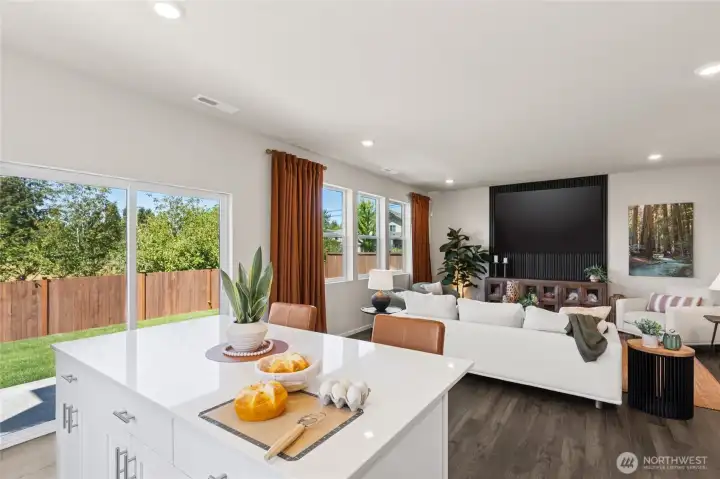 Very open concept lets the kitchen flow into the great room. Actual home is under construction and finishes, colors, and materials may vary. See site agent for details.