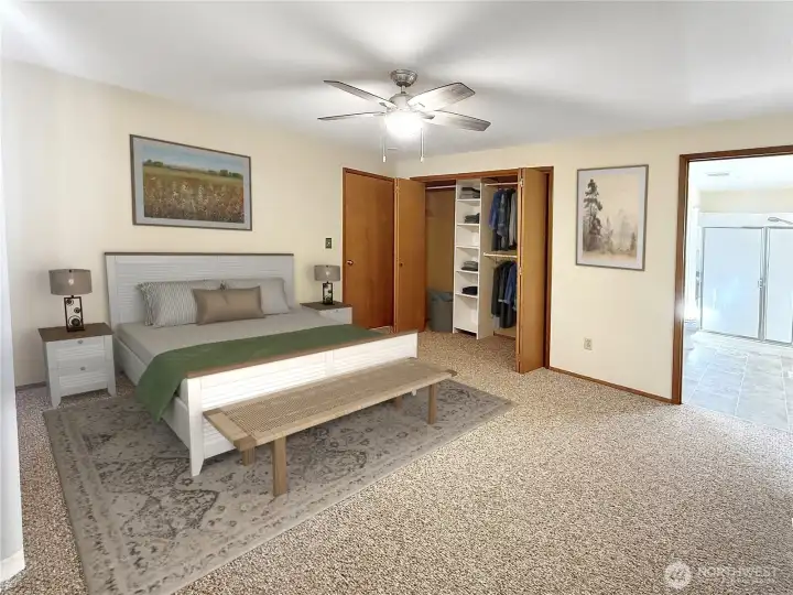 Primary bedroom with closet- virtually staged
