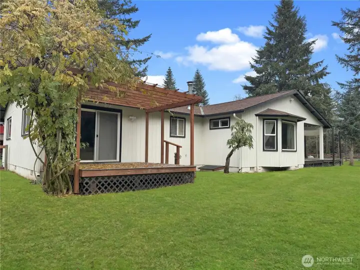 Deck with Wisteria off primary bedroom.
