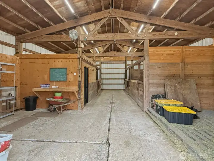 Barn Entrance.  Siding door seperates the stables from the run-ins.