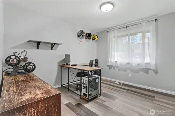 Bedroom #2, currently used as an office/gaming room.