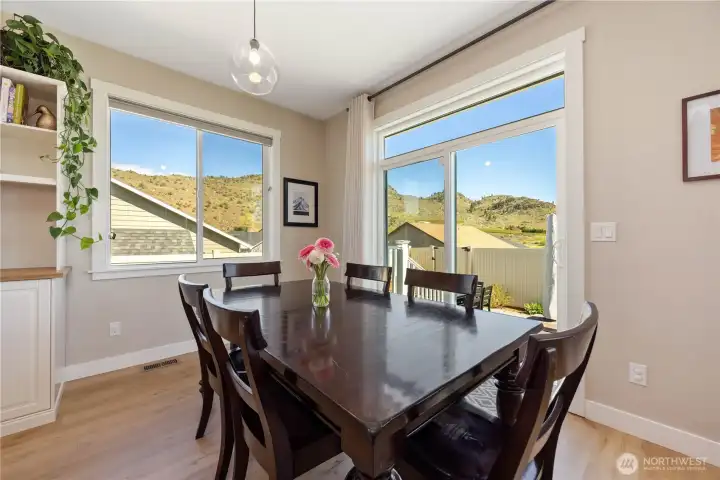 Dining with access to back yard and patio