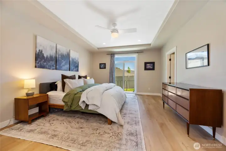 Primary suite with private patio access.