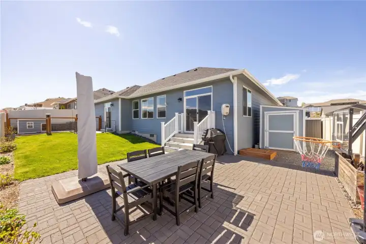 Great yard with patio, shed and grass for all your enjoyment.