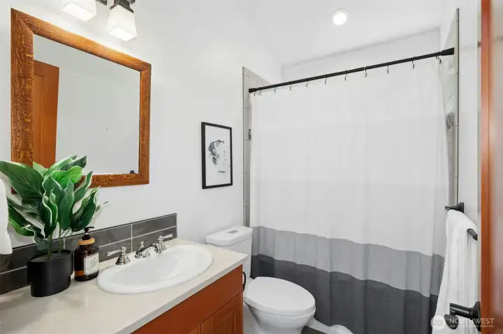 Well-appointed guest bath.