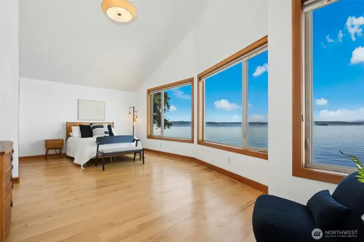 Expansivee primary suite with panoramic views at every turn.