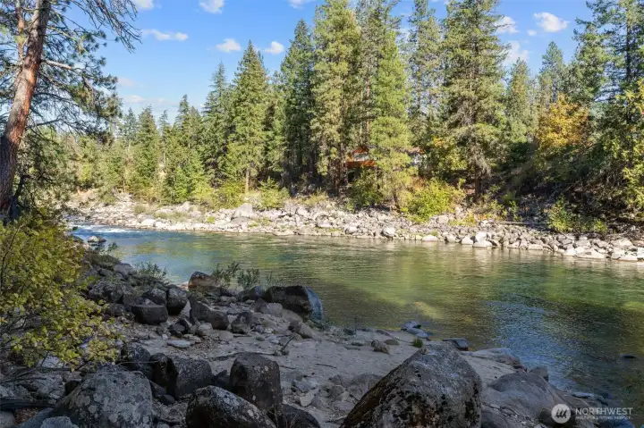 200 Feet of waterfront footage along with your own private sand bar!    This is the first property along the Wenatchee River where you can kayak / float or   paddleboard from your land into the town of Leavenworth (1.5 miles by road / ~2   hours by float)    Built path from Private Road to river & private beach – stabilized area with additional rocks.