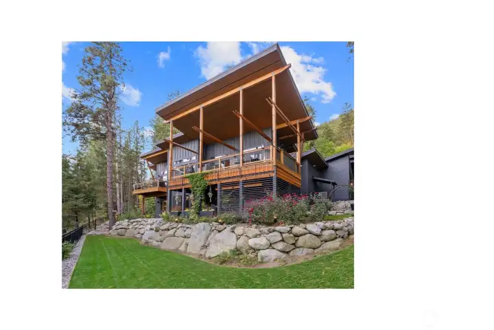 Beautiful landscaping and fully fenced in back yard. This stunning luxury retreat could be focused in Dwell magazine!