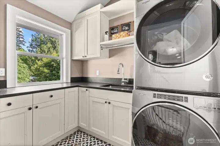 Upstairs laundry room. Upstairs laundry room.