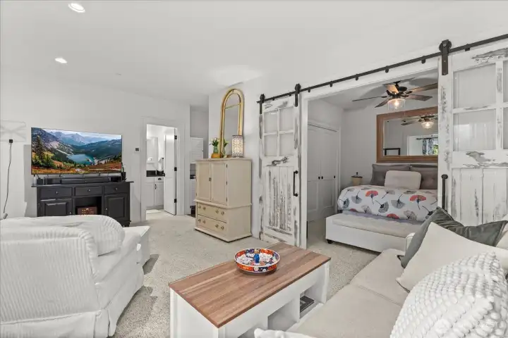 Downstairs bedroom with a kitchenette and 3/4 bath is perfect for guests or... Downstairs bedroom with a kitchenette and 3/4 bath is perfect for guests or...