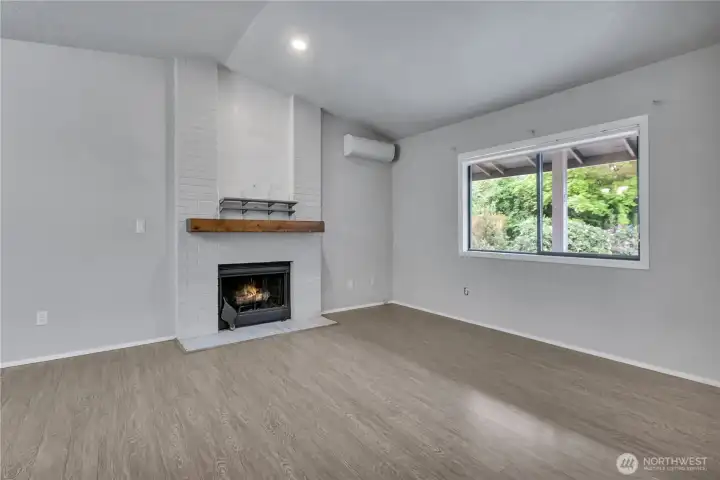 Spacious living room with vaulted ceilings.