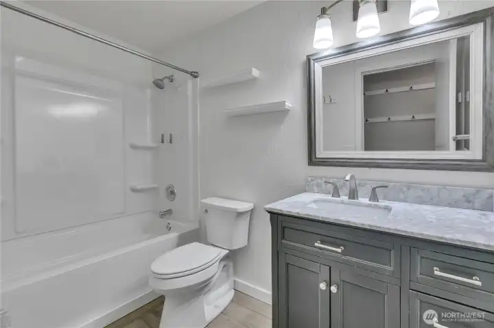 Full bathroom with tub.