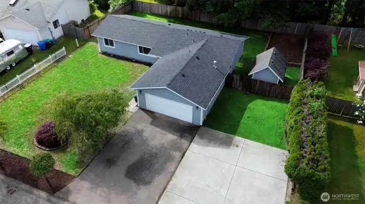 TONS OF PARKING INCLUDING RV AND STORAGE SHED TOO!