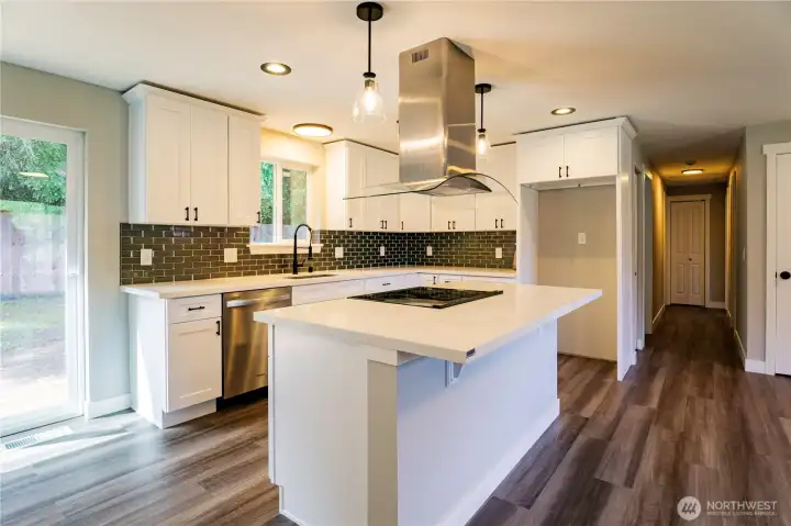 LOVE THIS RANGE HOOD AND BAR AREA